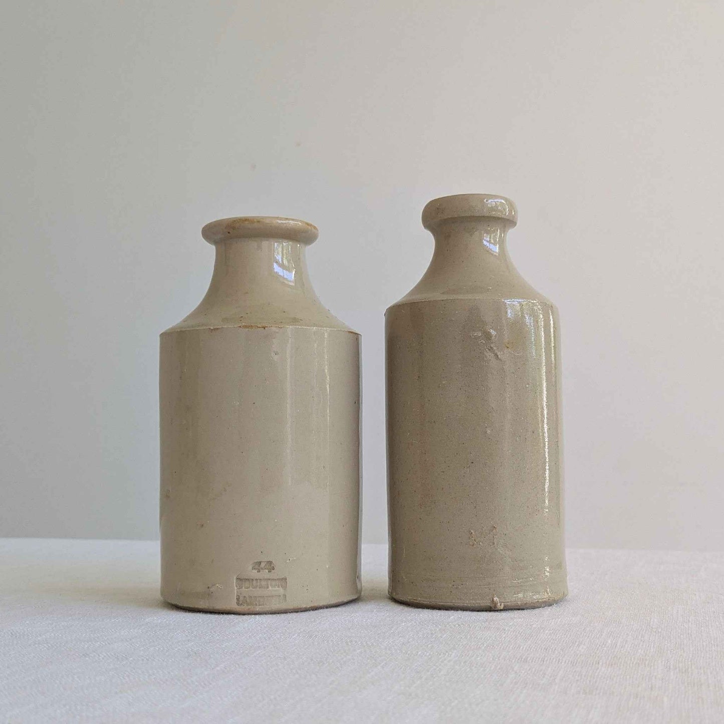 Antique Stoneware Bottle Pair