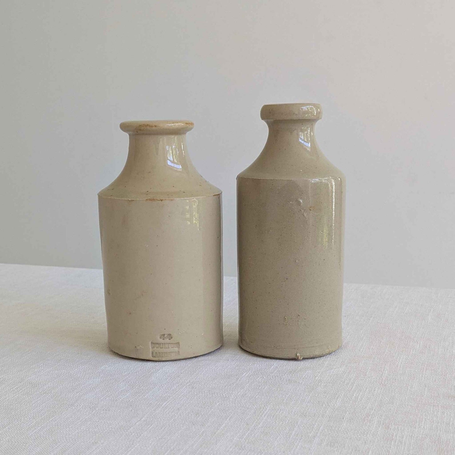 Antique Stoneware Bottle Pair