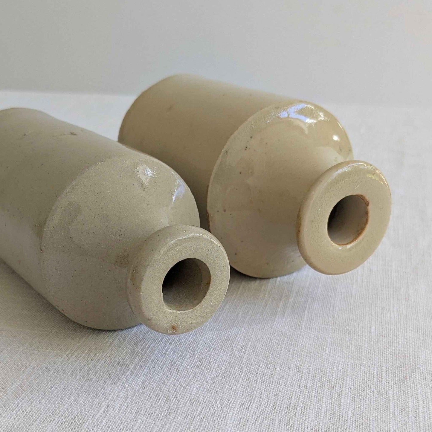 Antique Stoneware Bottle Pair