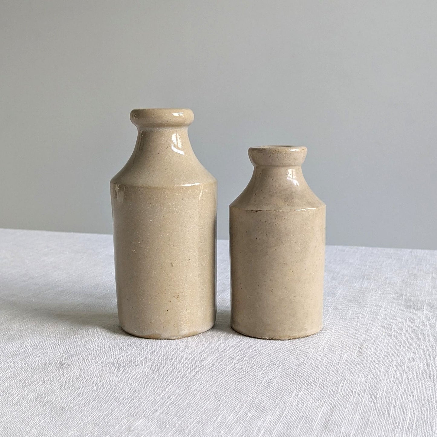 Antique Stoneware Bottle Pair
