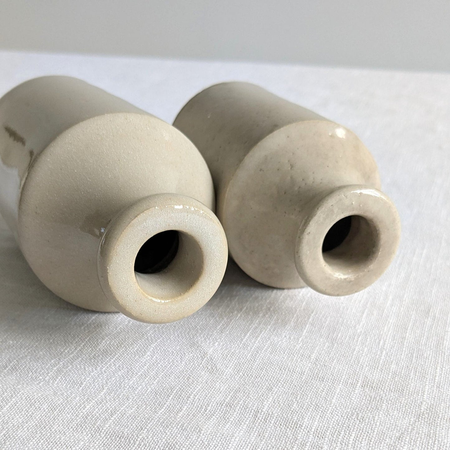 Antique Stoneware Bottle Pair