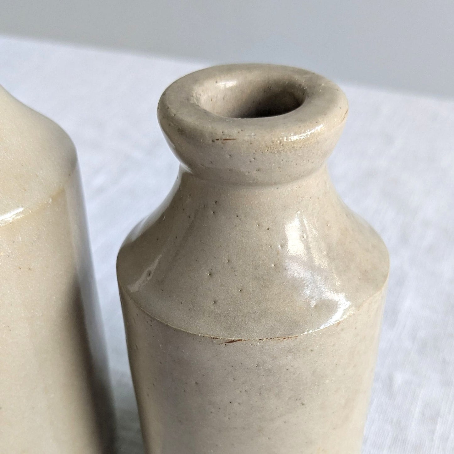 Antique Stoneware Bottle Pair
