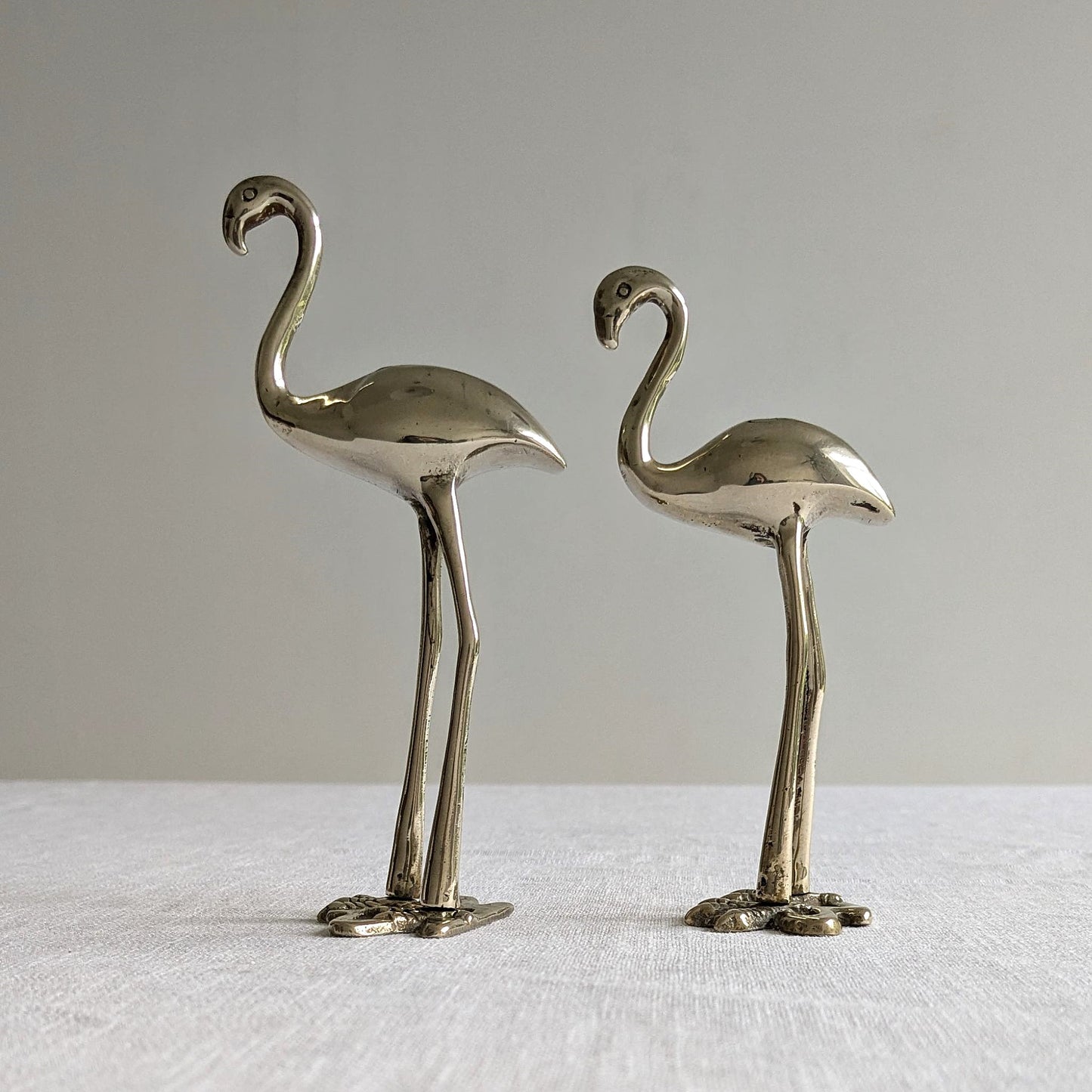 Brass Flamingos