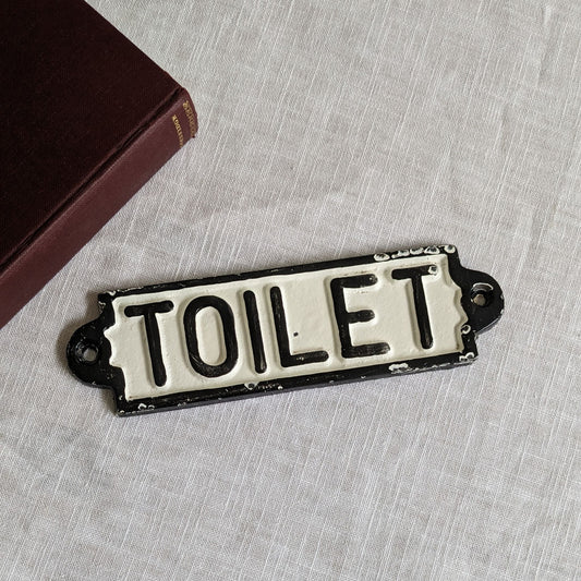 Cast Iron Toilet Sign