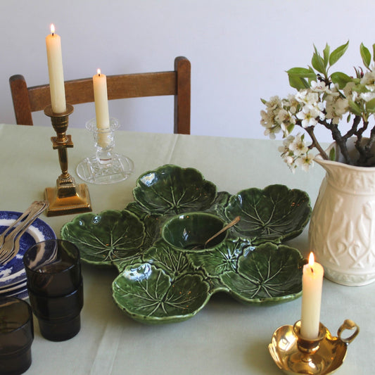 Vintage majolica cabbage leaf platter, dip tray in green, on table with candles and flowers