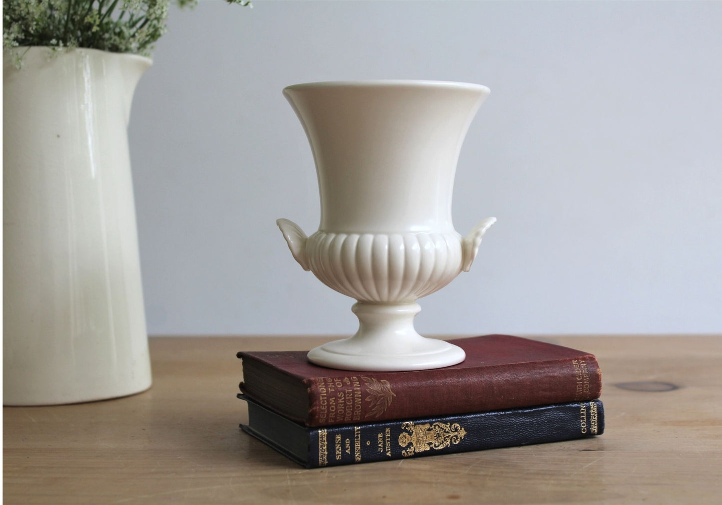 Wedgwood Moonstone Vintage Urn Vase on Books