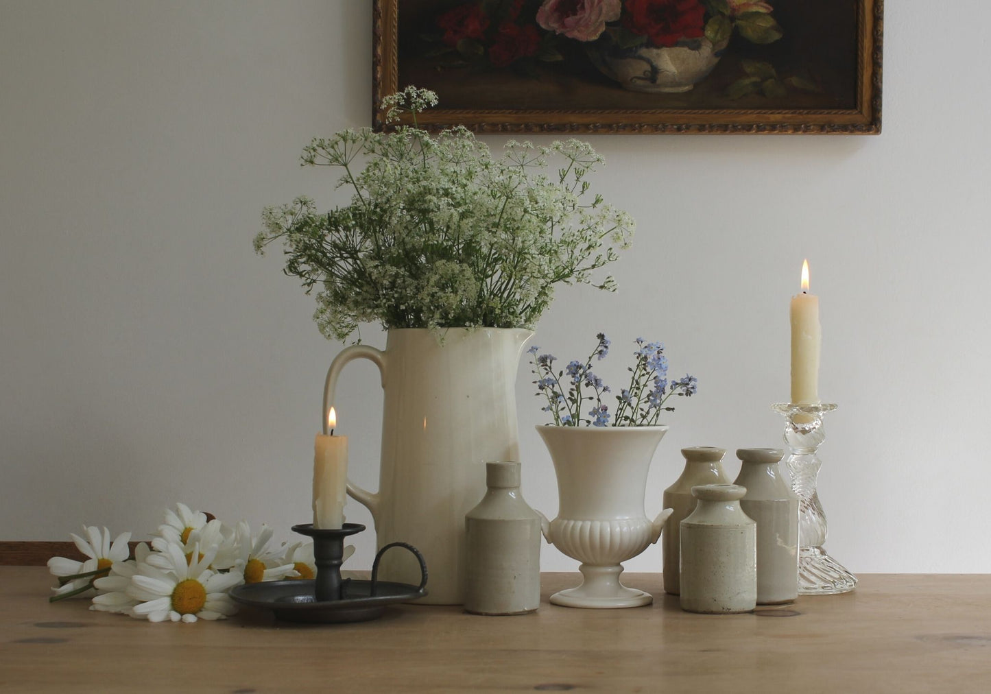 Vintage collection with Wedgwood Moonstone Urn Vase, Antique Bottles and Candles